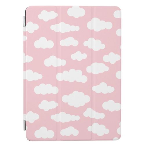 Cute iPad case with soft white clouds on a pastel pink background.