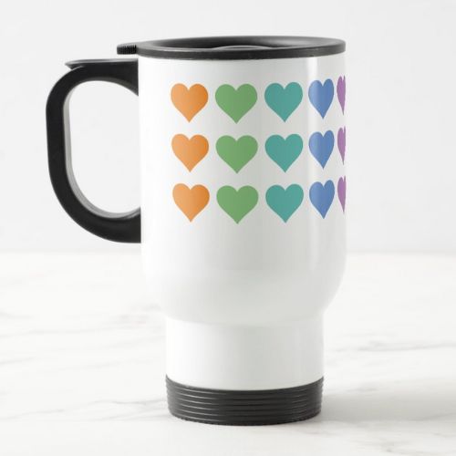 White travel mug with cute rainbow hearts design.